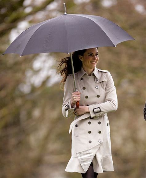 Kate Middleton's short Burberry trench coat with opaque black .